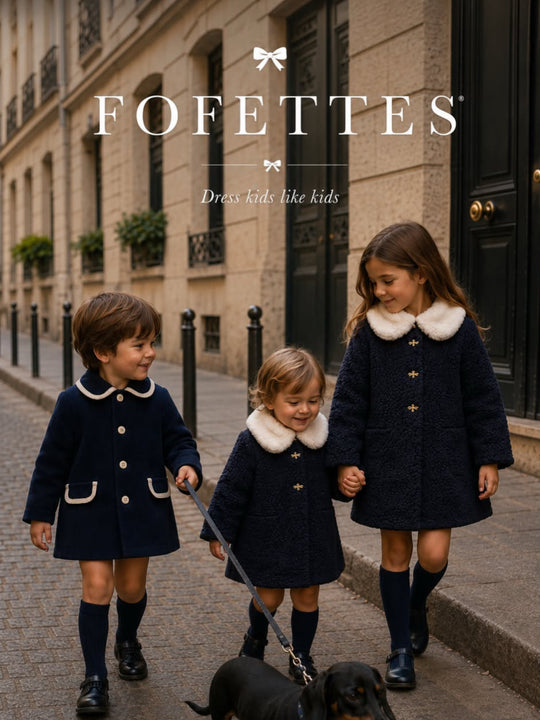 'Signature' navy boucle coat with faux fur collar