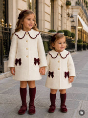 The 'Heritage'  ivory boucle coat with burgundy