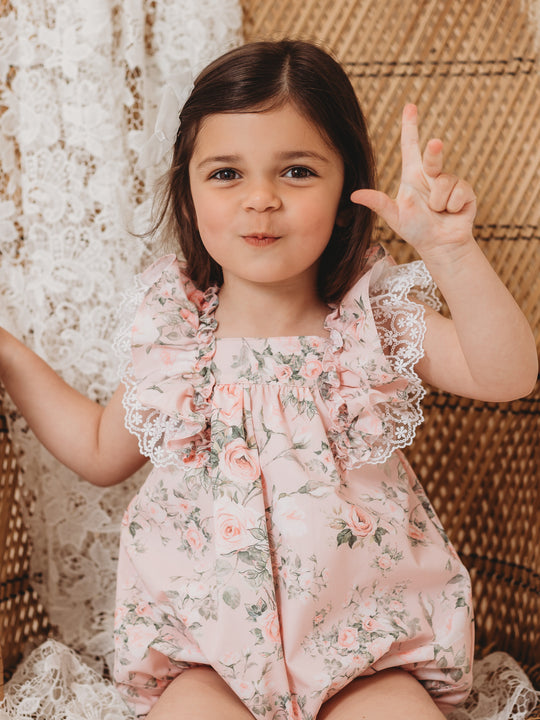 'Penelope' pink floral print strappy romper with lace